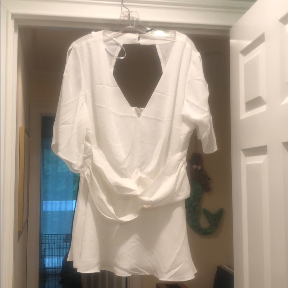 White, flowy, cut out silk blouse, size 18